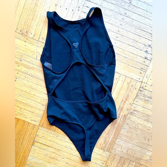 (3 for 50!) NWOT TNA sport cut out back body suit. Never worn. - Picture 2 of 4